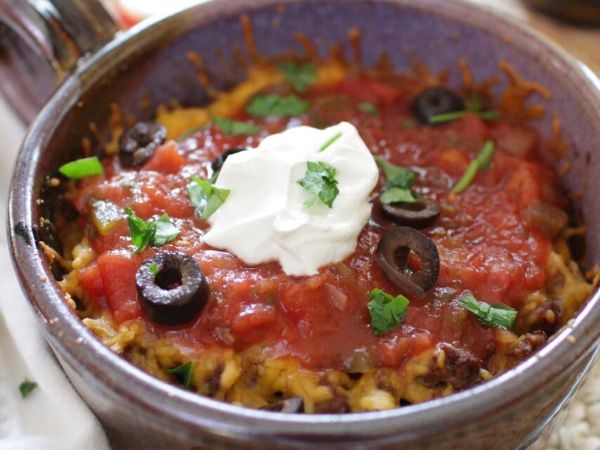 photo shows a bown with tacos and casserole topping