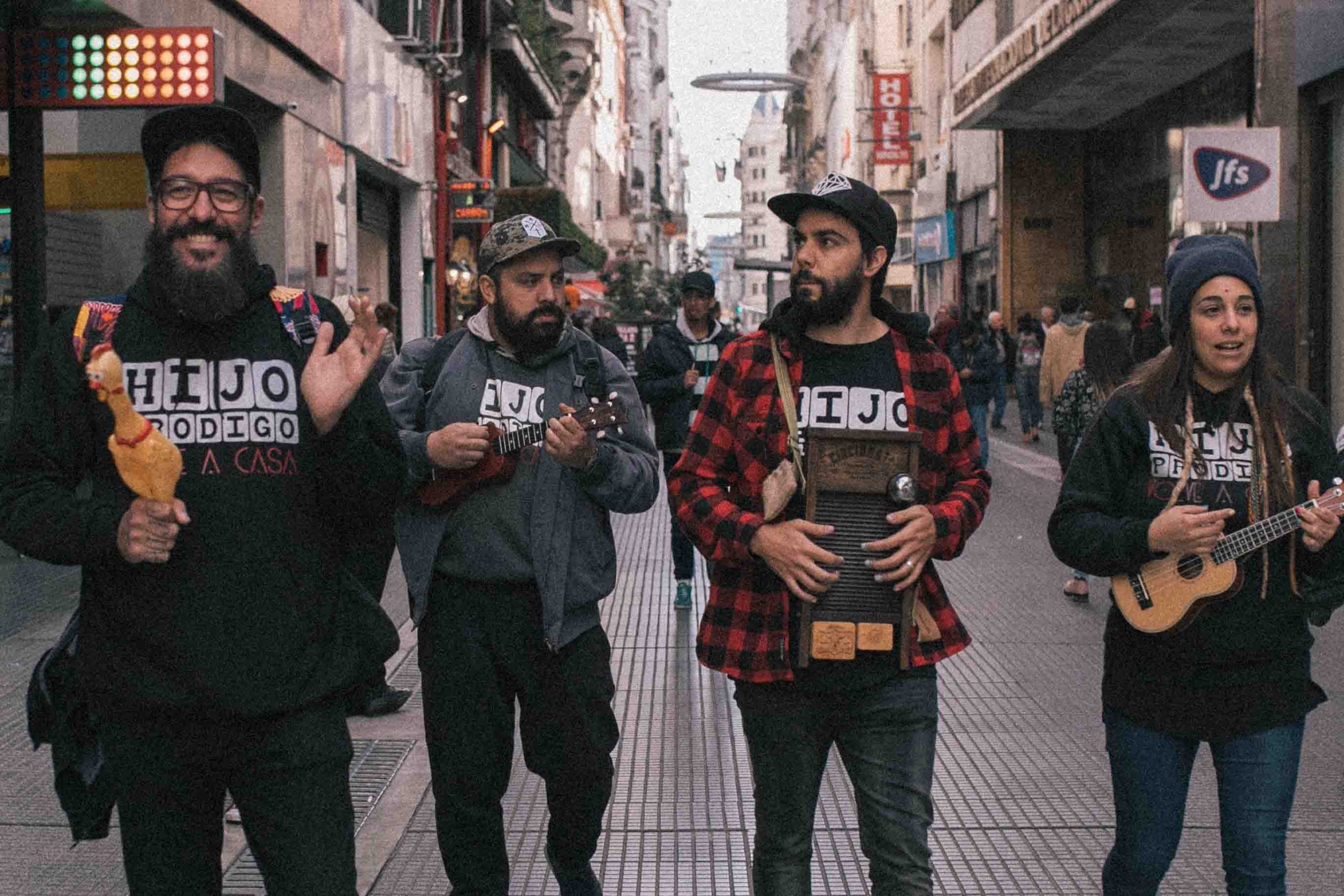 Hernan playing in street band