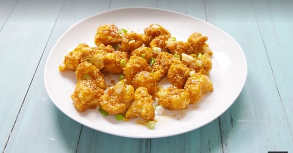 photo shows honey garlic coated cauliflower on a plate