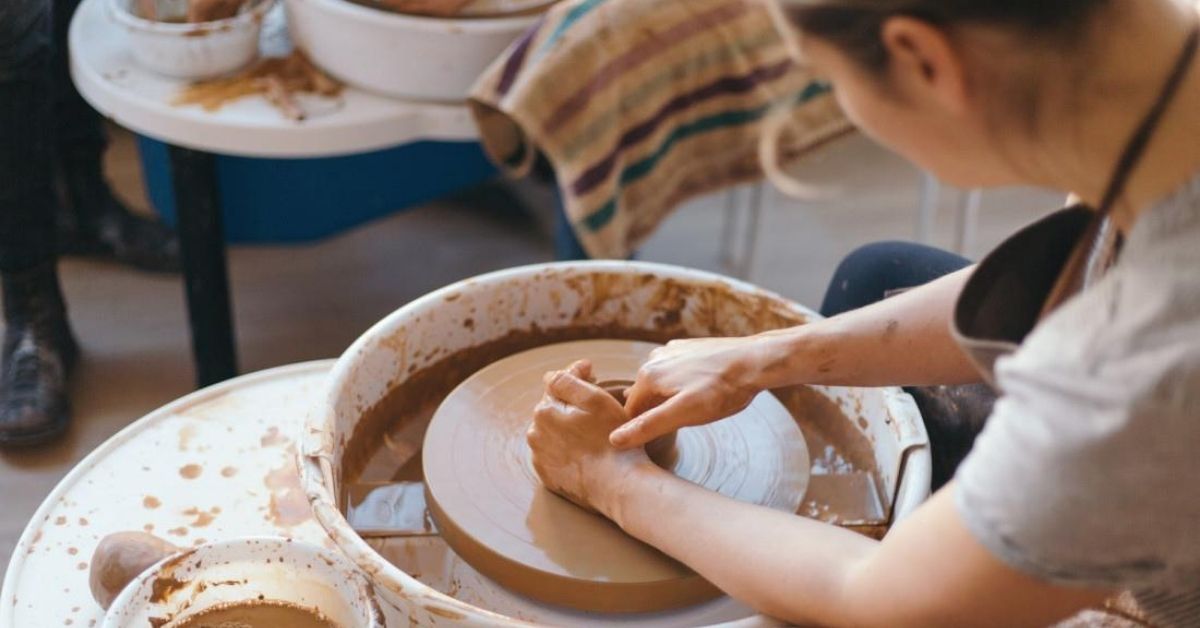 woman doing pottery